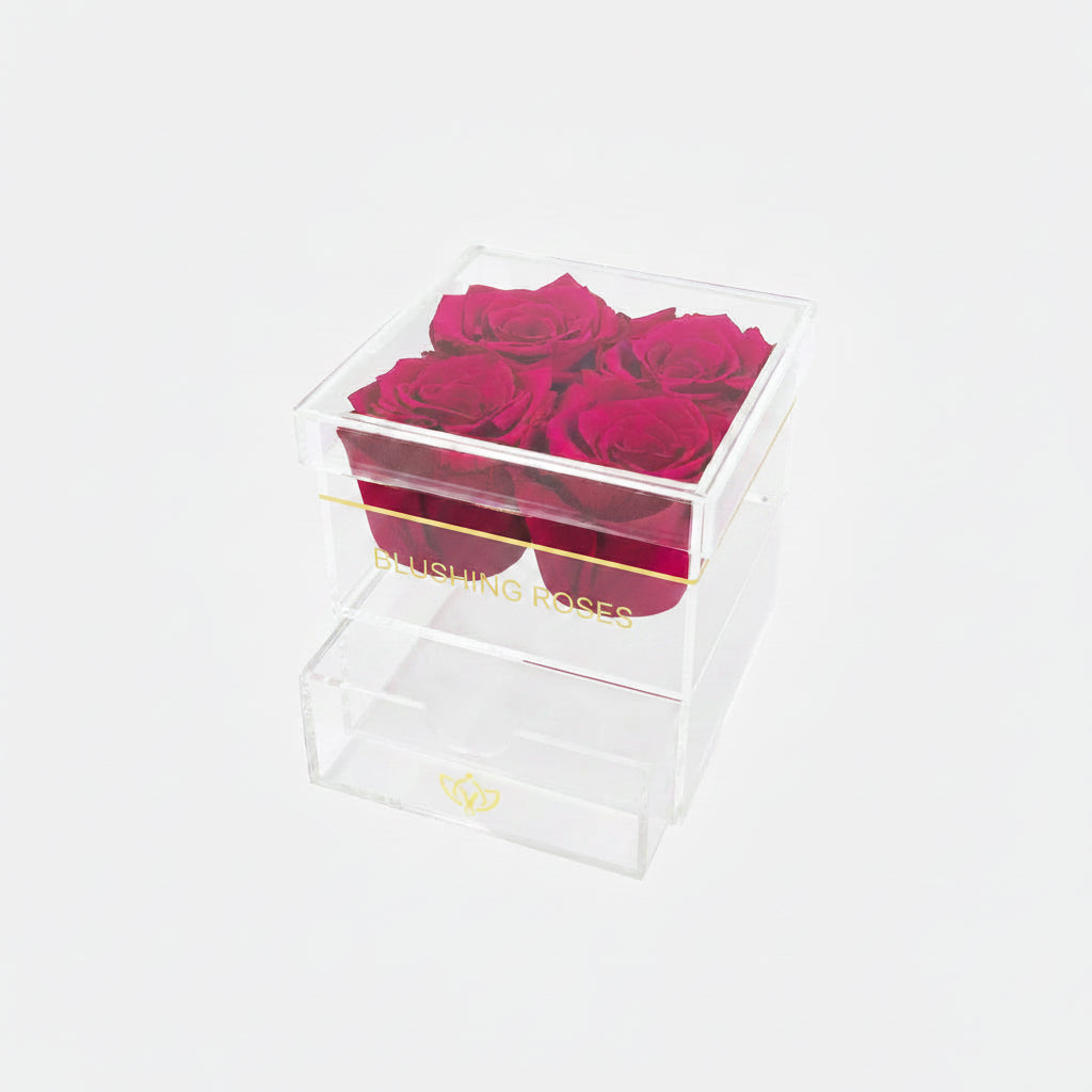 Clear box with pink roses and blushing roses branding on a white background