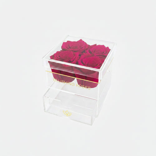 Clear box with pink roses and blushing roses branding on a white background