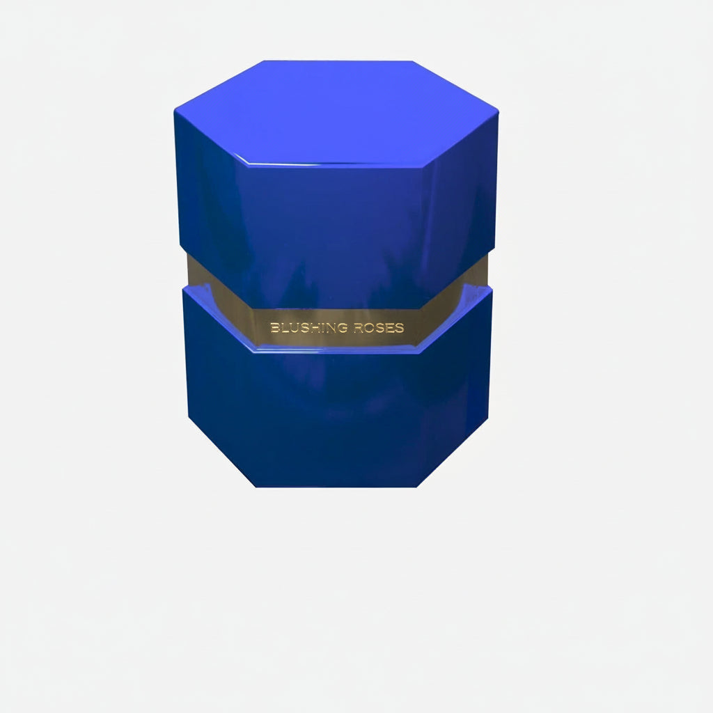 blue preserved rose arrangement in premium geometric flower box- luxury forever roses gift by blushing roses. Blue hexagonal container with gold band on a white background