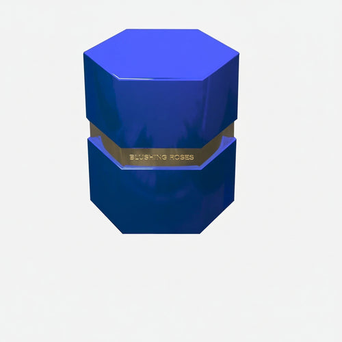 blue preserved rose arrangement in premium geometric flower box- luxury forever roses gift by blushing roses. Blue hexagonal container with gold band on a white background